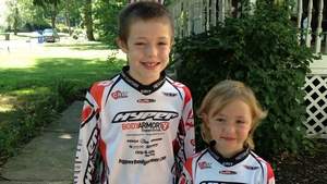 Cassidy Hall with her brother, Johnny, who also is a BMX racer. / CAROL KELLY/STAFF PHOTO